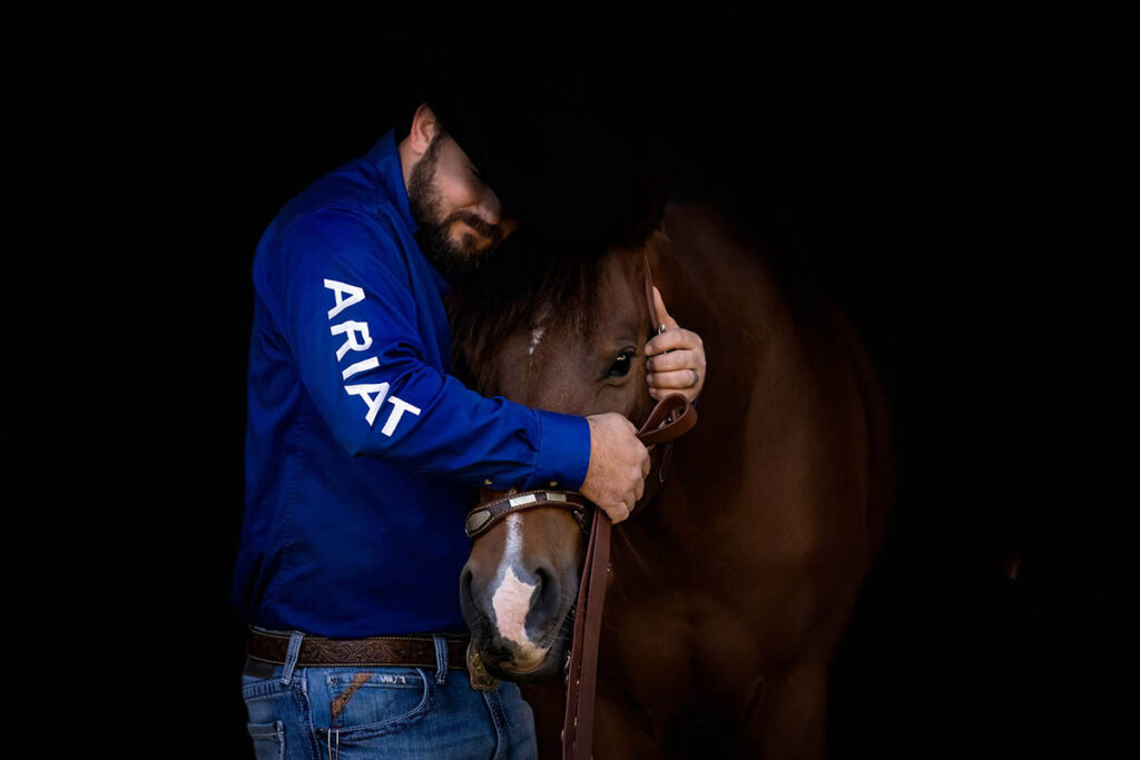 Cowboy loving on his Horse - Horse and Rider Session