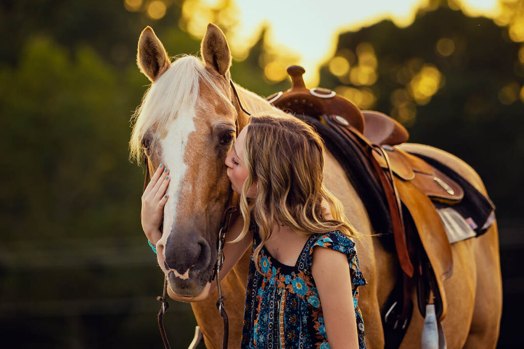 Cowgirl kissing her Horse - Horse and Rider Session