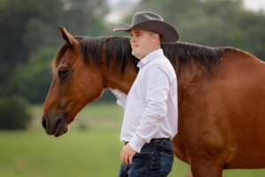 Cowboy and his horse, close up shot, head shot