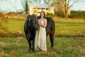 high school graduation photoshoot - girl with black bull