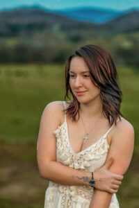 country graduation senior photo session - girl looking down