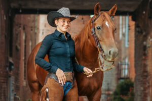 western cowgirl with her red mare at the mill Cleveland, tn