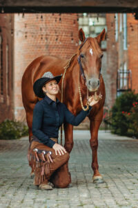 western cowgirl with her red mare at the mill Cleveland, tn