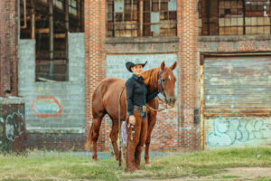 western cowgirl with her red mare at the mill Cleveland, tn