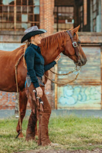 western cowgirl photoshoot with her red mare at the mill Cleveland, tn