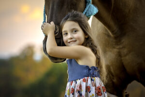 family photoshoot with horses in Tennessee