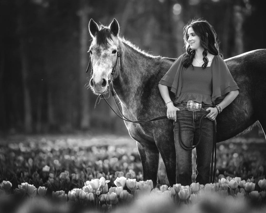 Senior horse and rider photography in a flower field