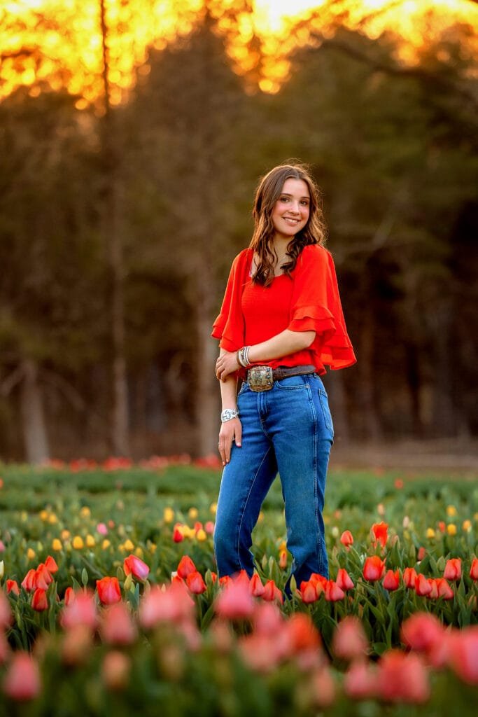 Senior equestrian portrait in a tulip field