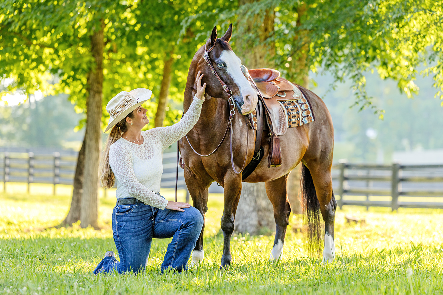 cowgirl women with horse in field