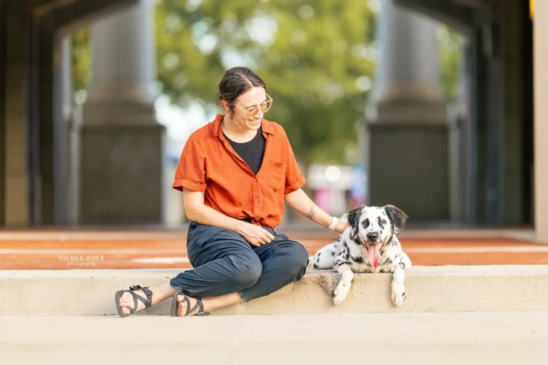 Michaela hugging her Dalmatian during a dog photography session in Cleveland, TN.